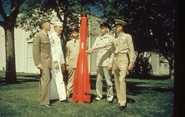 Slide: Servicemen and Rocket