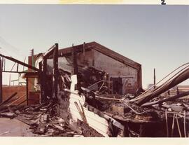 Photo: Intact Firewall and Damaged Building