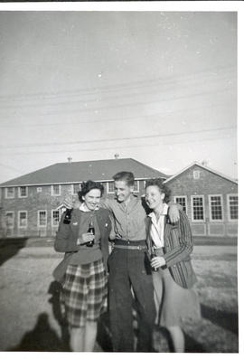 Photo: Two Women and One Man with Coca Cola