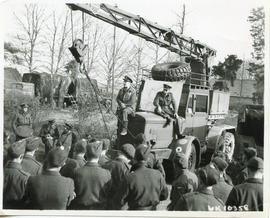 Photo: RCAF Personnel During Debriefing Outside