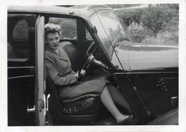 Photo: Woman and a Car