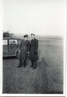 Photo: Airmen in Great Coats Next to Car