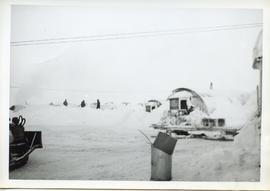 Photo: Arctic Scenery with Quonset Hut and Garbage Can