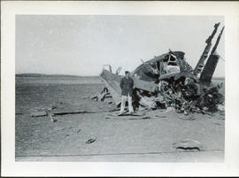 Photo: RCAF Airman in front of Wreck