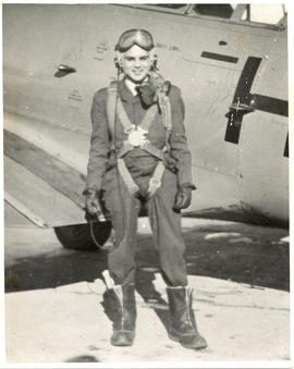 Photo: D.D. Bergie in front of T-6 Harvard (AF2014.038.084)