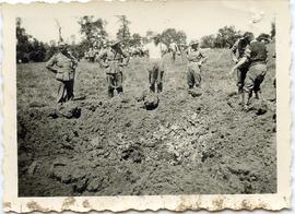 Photo: Five Germans and a Big Hole